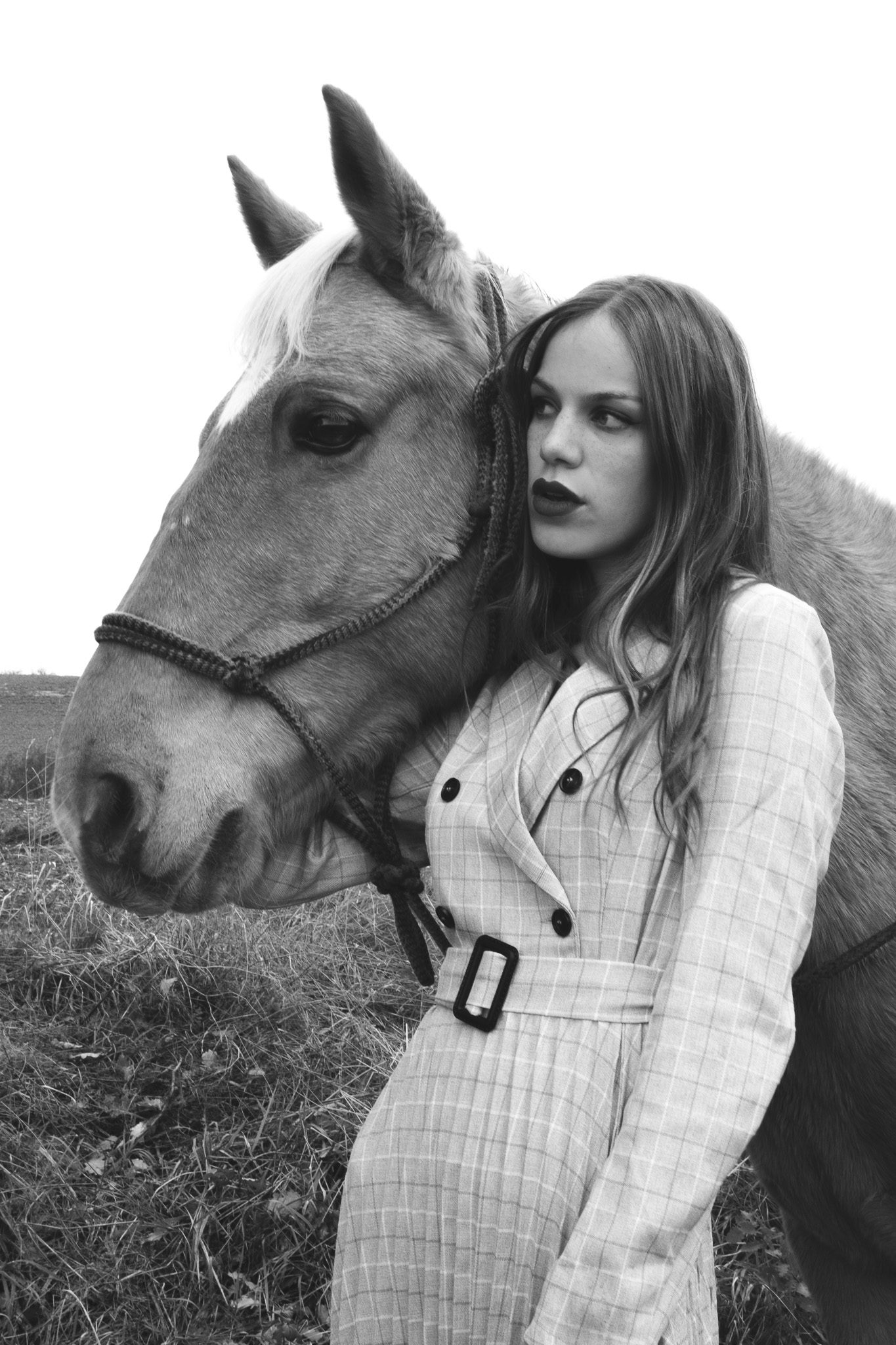 Photographie d'une cavalière et de son cheval